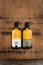 Matt Black Double Bracket holding Sweet Orange and Cardamom Conditioner and Shampoo