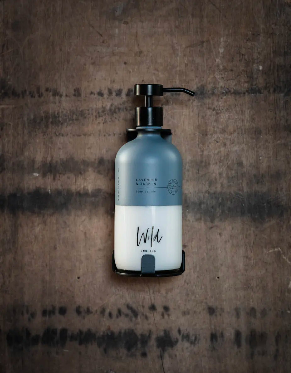 Matt Black Single Bracket holding Lavender and Eucalyptus body lotion