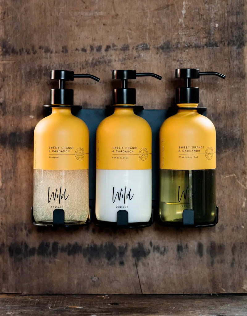 Matt Black Triple Bracket holding Sweet Orange and Cardamom Shampoo, Conditioner and Cleansing Gel