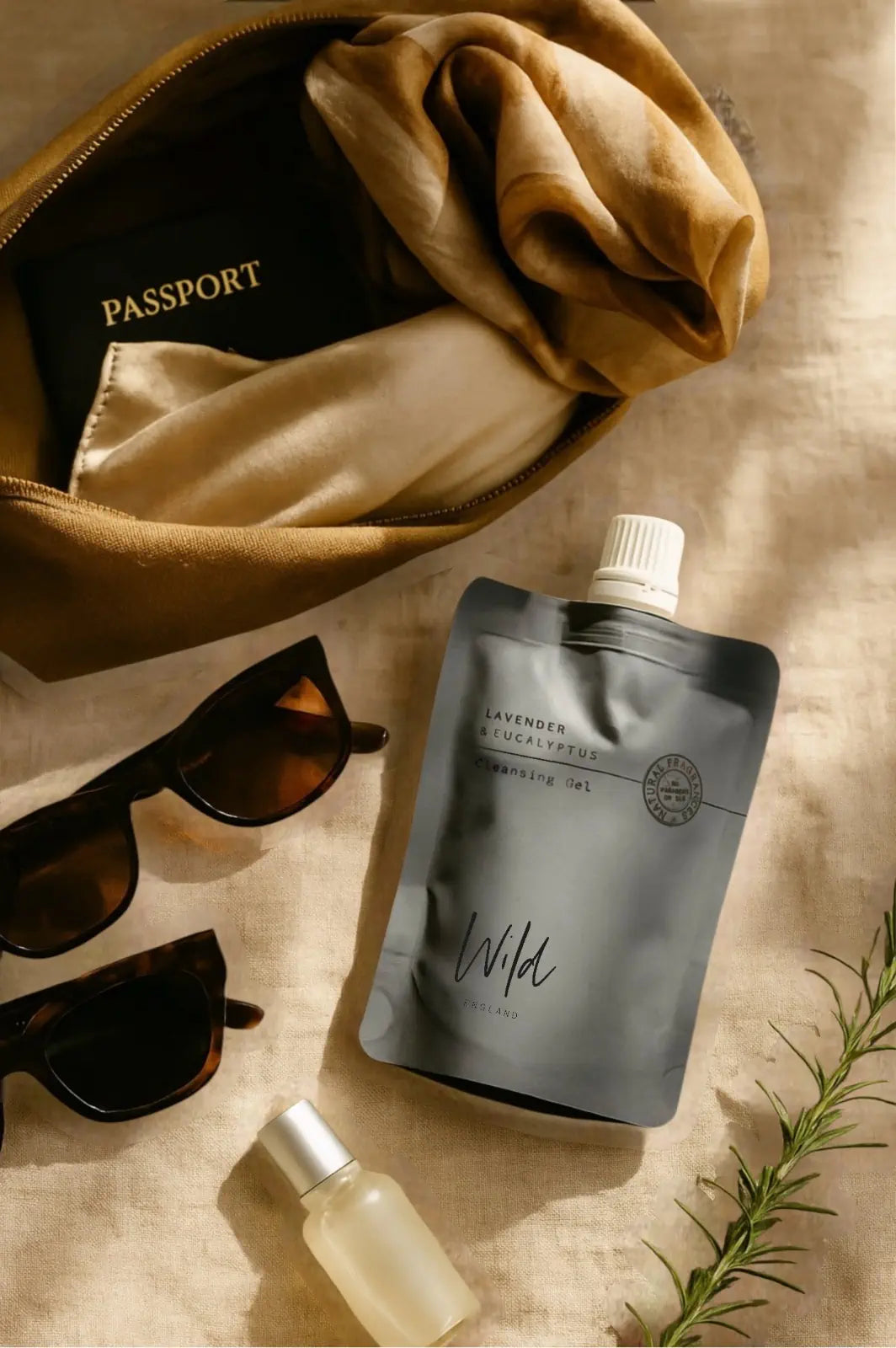 Wild England natural hand and body wash lavender and eucalyptus pouch 50ml sat next too sunglasses 